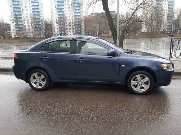2008 Mitsubishi Lancer X, синий - вид 4