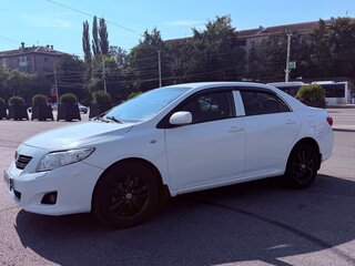2010 Toyota Corolla X (E140, E150), белый, 955000 рублей, вид 4