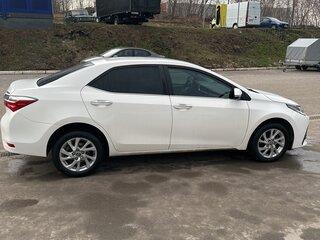 2016 Toyota Corolla XI (E160, E170, E180) Рестайлинг 1, белый, 2050000 рублей, вид 2