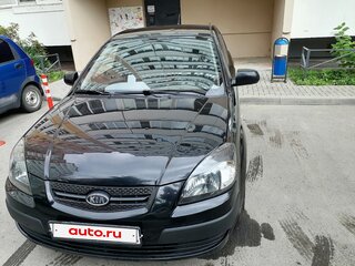2009 Kia Rio II, чёрный, 445000 рублей, вид 1
