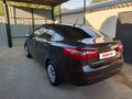 2014 Kia Rio III, коричневый - вид 4