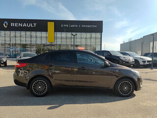 2014 Kia Rio 6-speed III, коричневый, 825000 рублей, вид 4