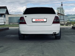 2002 Toyota Corolla IX (E120, E130), белый, 550000 рублей, вид 2