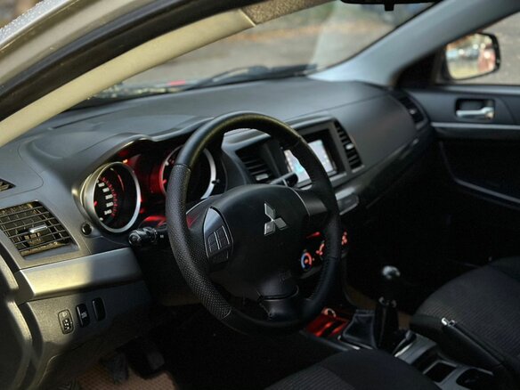 2008 Mitsubishi Lancer X, золотистый - вид 6