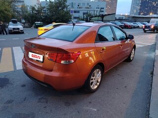 2011 Kia Cerato 6-speed II, оранжевый, 720000 рублей, вид 4