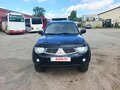 2011 Mitsubishi L200 IV, чёрный - вид 1