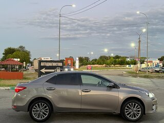 2013 Toyota Corolla XI (E160, E170, E180), коричневый, 1150000 рублей, вид 3