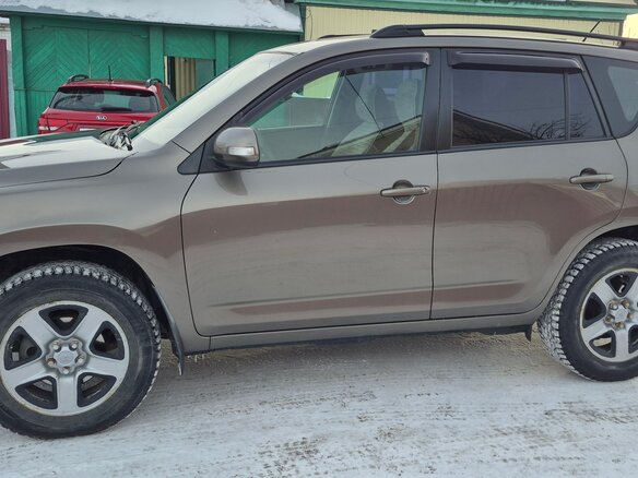 2010 Toyota RAV4 III (XA30) Рестайлинг, коричневый - вид 3
