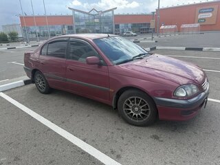 1999 Toyota Avensis I, красный, 326649 рублей, вид 2