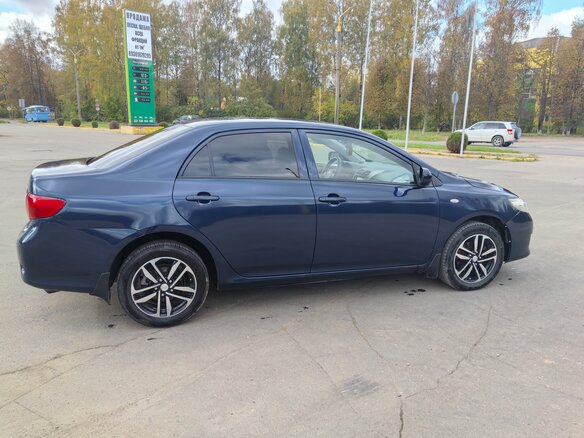 2009 Toyota Corolla X (E140, E150), синий, 650000 рублей - вид 1