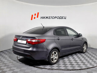 2015 Kia Rio 6-speed III, серый, 869000 рублей, вид 5