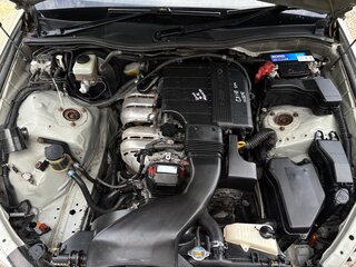 2002 Toyota Mark II IX (X110), серебристый, 553000 рублей, вид 4