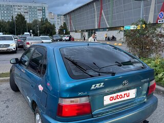 1997 Toyota Corolla VII (E100), синий, 65000 рублей, вид 4