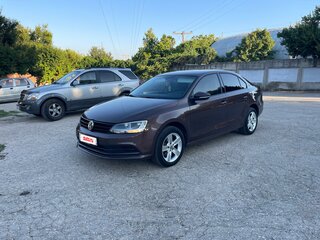 2014 Volkswagen Jetta VI Рестайлинг, коричневый, 1150000 рублей, вид 1