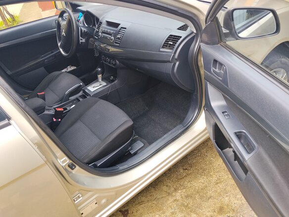 2008 Mitsubishi Lancer X, бежевый, 750000 рублей - вид 4