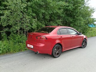 2008 Mitsubishi Lancer X, красный, 690000 рублей, вид 4