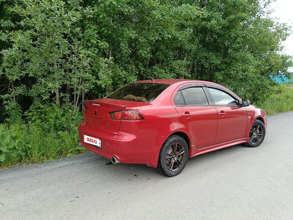 2008 Mitsubishi Lancer X, красный, 649000 рублей - вид 3