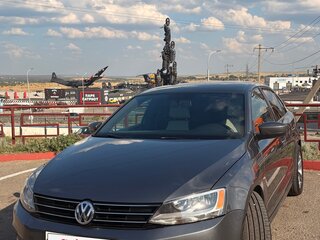 2016 Volkswagen Jetta VI Рестайлинг, серый, 1370000 рублей, вид 2
