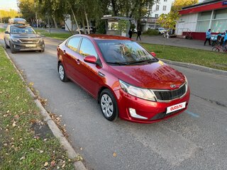 2011 Kia Rio 4-speed III, красный, 650000 рублей, вид 3