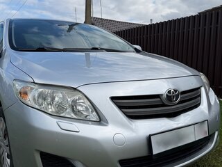 2009 Toyota Corolla X (E140, E150), серебристый, 950000 рублей, вид 2