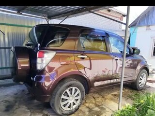 2011 Toyota Rush I, коричневый, 850000 рублей, вид 3