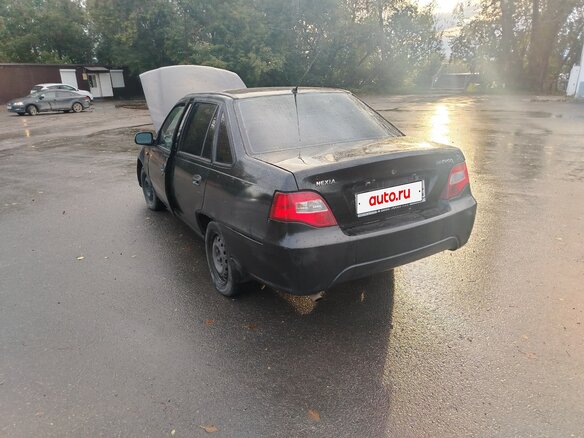 2010 Daewoo Nexia I Рестайлинг, чёрный - вид 2