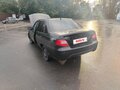 2010 Daewoo Nexia I Рестайлинг, чёрный - вид 2