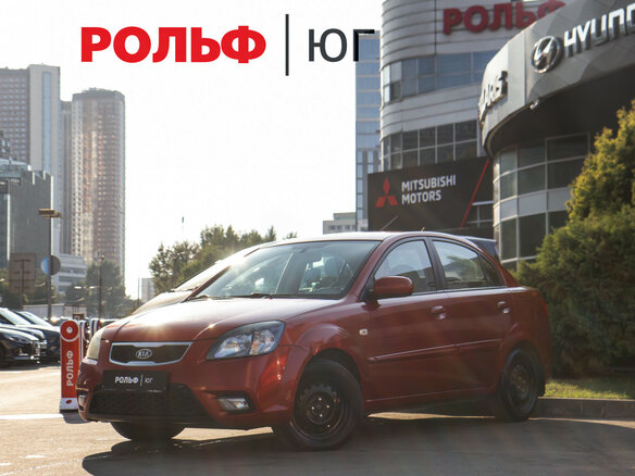 2010 Kia Rio II Рестайлинг, красный