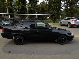 2009 Daewoo Nexia I Рестайлинг, чёрный, 150000 рублей, вид 3