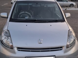 2005 Toyota Passo I (C10), серебристый, 335000 рублей, вид 1