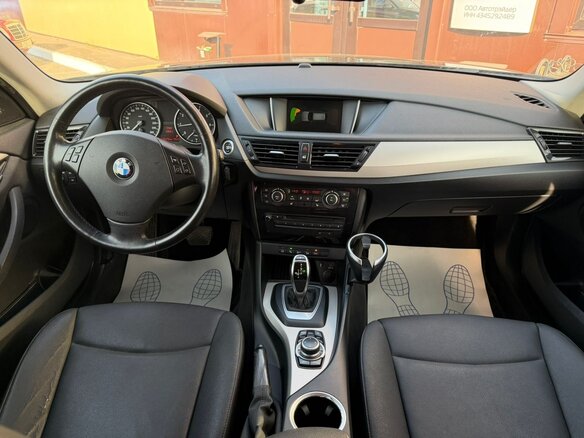 2014 BMW X1 20i I (E84) Рестайлинг, коричневый, 1480000 рублей - вид 12