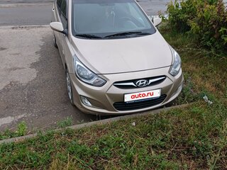 2011 Hyundai Solaris I, золотистый, 729000 рублей, вид 1