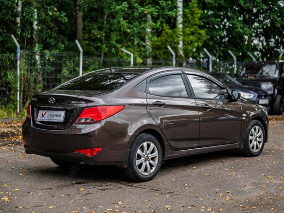 2014 Hyundai Solaris I Рестайлинг, коричневый, 875000 рублей - вид 1