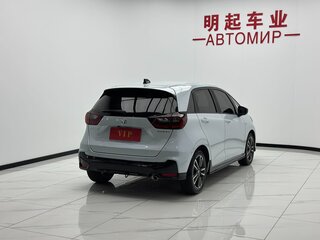 2023 Honda Fit Crosstar IV Рестайлинг, белый, 975000 рублей, вид 4