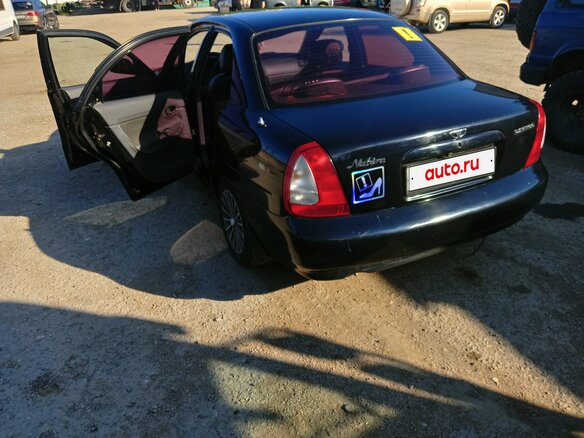 1999 Daewoo Nubira I, чёрный, 300000 рублей - вид 5
