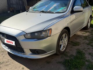 2011 Mitsubishi Lancer X Рестайлинг, белый, 419000 рублей, вид 1