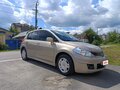 2010 Nissan Tiida I, коричневый - вид 4