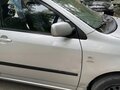 2003 Toyota Corolla IX (E120, E130), серебристый - вид 4