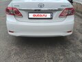 2011 Toyota Corolla X (E140, E150) Рестайлинг, белый, 1100000 рублей - вид 2