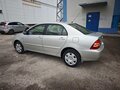 2005 Toyota Corolla IX (E120, E130) Рестайлинг, серебристый, 1090000 рублей - вид 7