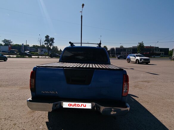 2010 Nissan Navara (Frontier) III (D40) Рестайлинг, синий, 850000 рублей - вид 5