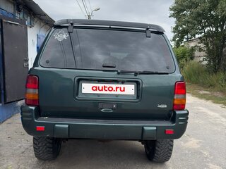 1998 Jeep Grand Cherokee I (ZJ) Рестайлинг, зелёный, 995000 рублей, вид 3