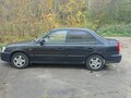 2008 Hyundai Accent ТагАЗ II, чёрный - вид 2