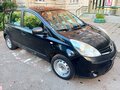 2011 Nissan Note I Рестайлинг, чёрный, 530000 рублей - вид 2