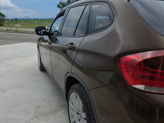 2010 BMW X1 18i I (E84), коричневый, 850000 рублей, вид 5