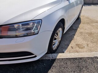 2015 Volkswagen Jetta VI Рестайлинг, белый, 1150000 рублей, вид 3
