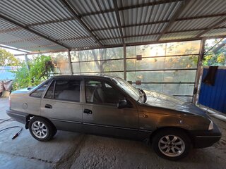 2003 Daewoo Nexia I, коричневый, 165000 рублей, вид 3