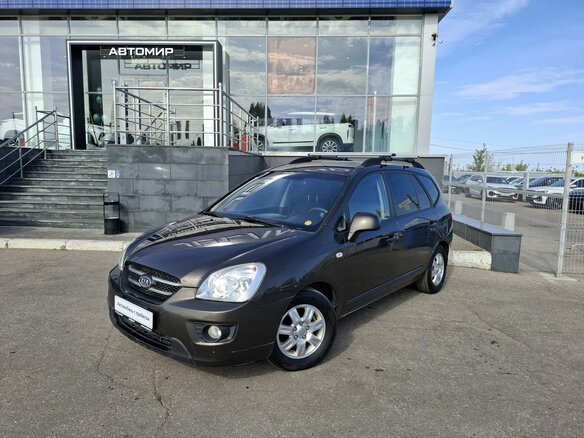 2010 Kia Carens II (UN), коричневый, 740000 рублей
