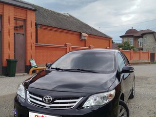 2010 Toyota Corolla X (E140, E150) Рестайлинг, чёрный, 859000 рублей, вид 1