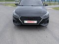 2019 Hyundai Solaris II, чёрный, 950000 рублей - вид 1